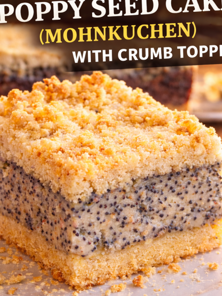 German Poppy Seed Cake Mohnkuchen with golden crumb topping on a rustic wooden table, slice removed to show creamy filling.
