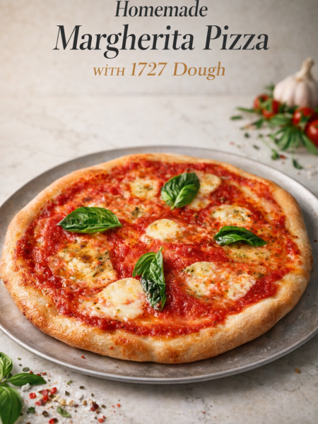 Finished marigta pizza made with 1727 dough recipe on wooden board with crispy crust and fresh basil garnish