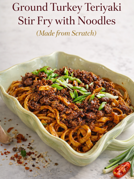 A sharing bowl filled with Ground Turkey Teriyaki Stir Fry with Noodles, garnished with fresh green onions.