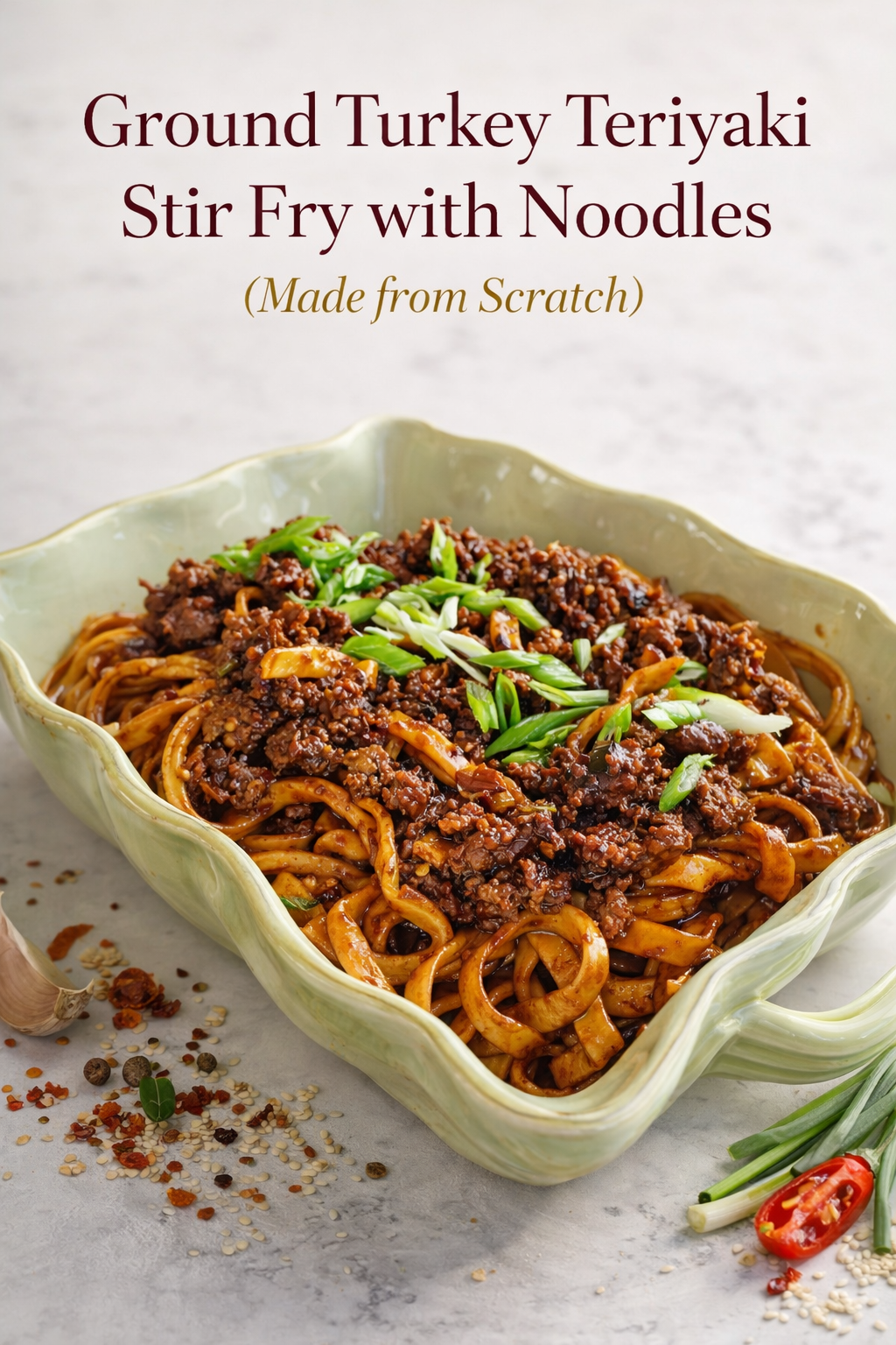 A sharing bowl filled with Ground Turkey Teriyaki Stir Fry with Noodles, garnished with fresh green onions.
