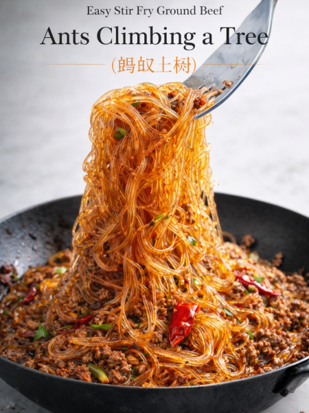 Ground Beef Ants Climbing a Tree served in a white bowl with chopsticks, showing savory ground beef clinging to translucent glass noodles
